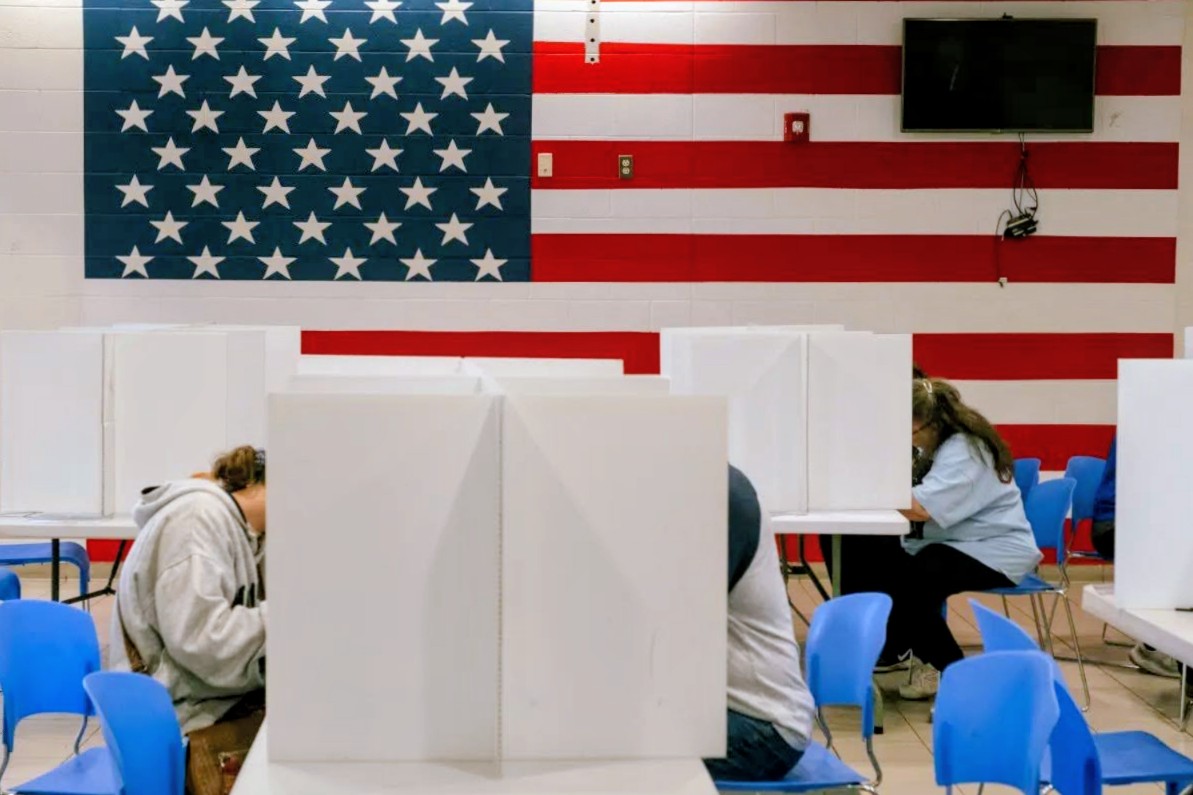 Voters in Newtown, Connecticut fill out their ballots for the 2024 general election. (Credit: Shahrzad Rasekh / CT Mirror)